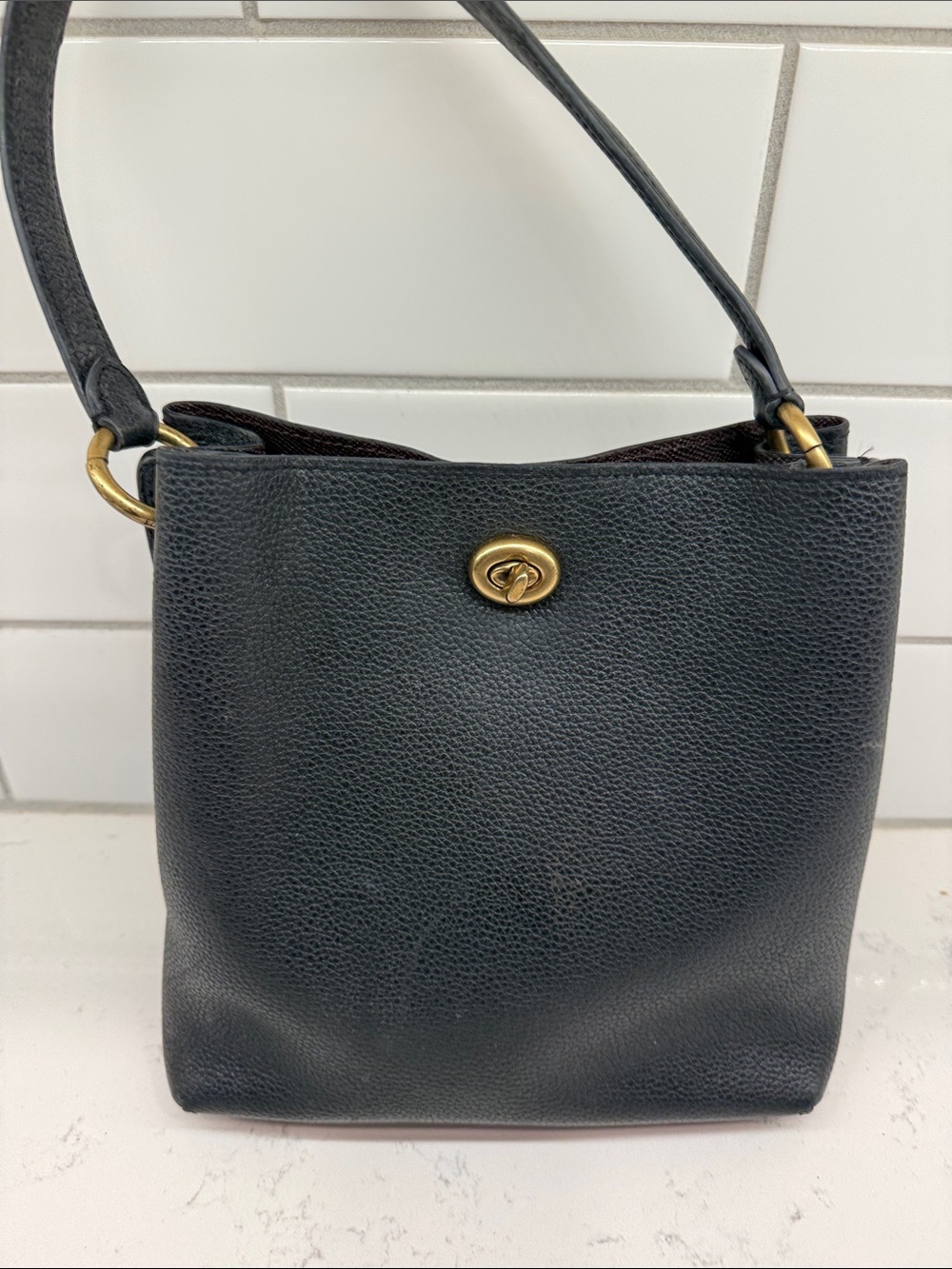 Classic Charlie Black Leather Shoulder Bucket Bag with Turnlock Accent